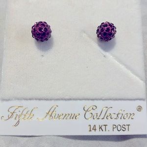 Purple Swarovski crystal earrings with 14kt gold posts. 1/4inch diameter